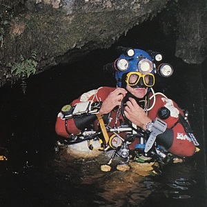 British cave diver, Geoff Crossley in the resurgence pool at Keld Head